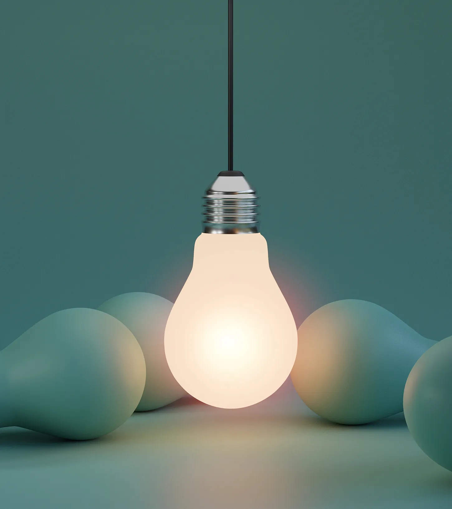 Lightbulb glowing among many unlit bulbs symbolizing unique SEO ideas