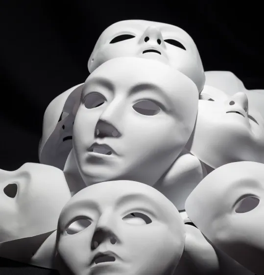 Stack of white masks representing content that lacks value